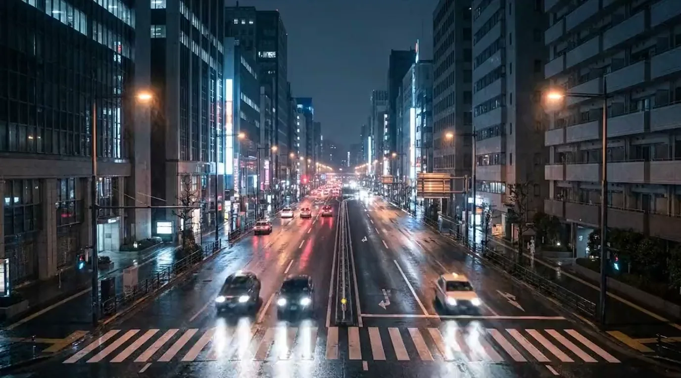 Road camera view from a gantry looking down on four lanes of traffic